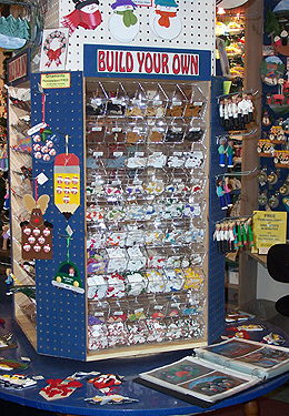 Spinning tower of bins for little pieces